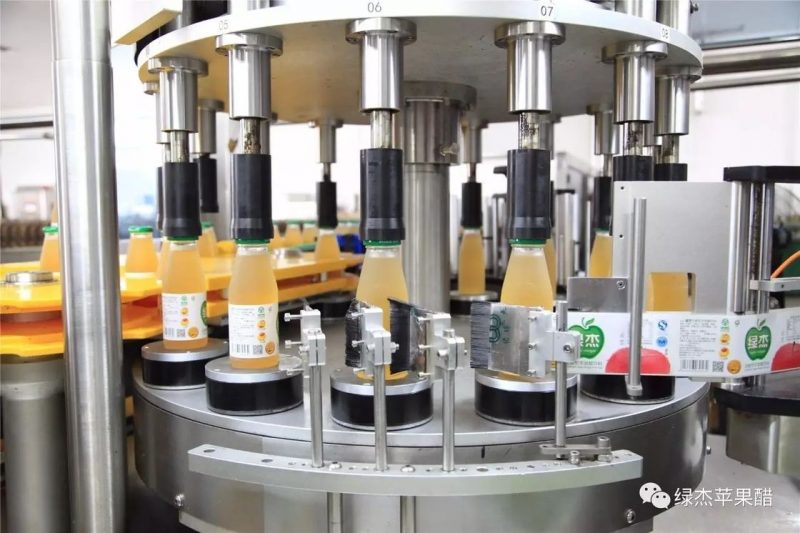 China Ronde fles roterende labeler met rotatieschotel Etiketteringsmachine Systeem leverancier